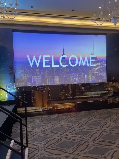Corporate stage backdrop and event graphics installed by ADS